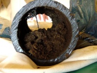 Blackish brown deposits blocking pipes?